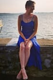This dress is stunning. The cut and length of it is perfect (which is very hard for tall, skinny girls like me to find). The top part was just a fraction too loose but I also have no chest so! For those who are voluptuous, you're lucky and can make this work. I'm usually a XS or S but like to have room in my clothing to breathe/move so ordering this in a small was fitted enough and still comfy to function in. I can't wait to wear this again and again and again. I felt like a mermaid in it! - Tess B.