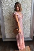 I wore this dress to a wedding and it was perfect. I am only 5'1" so I wore about 4 inch heels to avoid having to get it hemmed and it fit like a glove. I received so many compliments. - Natalie C.