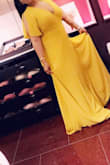 I love the color and the material. The dress is amazing and so comfortable. - Eiman A.