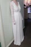 Beautiful dress! Slightly too big but it's fine! I'll order a small as well. Super happy! - Rachael M.