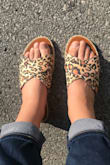 I have wide feet so finding sandals like these that fit the width and length of my feet is difficult. I normally wear a size 7.5 and got the 7.5! I haven't worn them a lot yet so don't know about stretching but they seem like good quality for the price. - Marissa S.