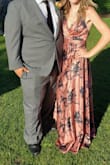 This dress was great. I wore it to a wedding that was listed as requiring Elegant Garden Party attire. I got a bunch of compliments. I am 5'1" and wore this dress with 3" heels and didn't have it hemmed. It dragged a little bit but it was fine. It was slightly tight at the top of the zipper but it didn't make it uncomfortable. - Kayla W.