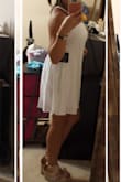 I like this dress a lot. It is very cute and perfect for the summer. It balloons out so much in the hips (lower part of the dress) though, which is why I didn't give it a 5/5. Still keeping it! Great quality. It has lining underneath so it isn't see-through. - Kathleen G.