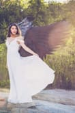 The dress is gorgeous and exactly as pictured. I bought it for a photoshoot and everyone there was complimenting how pretty it was. It fit true to size for me, especially for my waist which is about 26inches. Originally I wanted the Grey but they were out of stock. I'm very happy with the white one. - Olivia K.