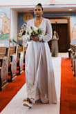 I wore this dress a bridesmaid in my friend's wedding and couldn't have been happier with it! It fit so nicely since it is a wrap dress, which allows for some adjustment in sizing, and I tied it as tight as I could. It was the perfect size. The dress was long enough for me to wear platform sandals and the sleeves were a great length for my longer arms. I wasn't concerned with my cleavage falling out, and I didn't use fashion tape for the neckline. I got so many compliments from guests at the wedding and am excited to wear this dress again in the future! I added a simple lace sash for my waist just to add a little more detail since I was a bridesmaid, but I love that this dress is versatile and I can wear it more casually or dress it up more! Definitely recommend! - McKenna W.