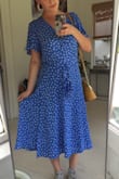 It's such a beautiful color. The wrap can be a little bit small in the stomach, but the length is perfect. I chose to stitch the sleeves together at the bottoms, and I am pleased with that decision. - Lauren R.