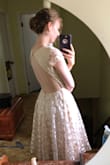 This dress was absolutely perfect for my bridal shower tea! The open back was stunning. I got so many compliments. The material is really good quality as well! The top was a bit big, but that because I'm only a B cup. It still worked and was gorgeous! So worth the money. - Katherine R.