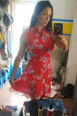 This dress is amazing. Fits perfectly and runs true to size. Very flattering buttoned or unbuttoned. The length is perfect not too flashy not too modest. Will be ordering the blue as well! - Cheyenne S.