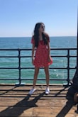 beautiful and just like the photos shows. The cleavage was a little too deep for me, but I wore it with a top underneath and it looked great! A little tight around my arms. - Ana L.