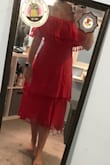 I don't do red but decided to be adventurous for vacation. It's okay, I think I'm bias on the whole red thing. It will do for only paying $12! It fit great as a positive! - Meredith B.