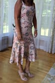 I bought this dress to wear for my Mother's 60th Birthday party and it was perfect. The fit was perfect, I was able to wear a regular bra because the top tie covered my bra strap. I wore it with some nude heels and got so many compliments on the dress.  Perfect for any summer outing! I loved it! - Amanda D.