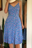 I love this dress. Good workmanship and fabric quality. I usually order XS, but don't like tight feeling around the waist, so ordered SM (based on reviews). I should have paid attention to the waist size when people were saying XS was tight. It fits, but a bit roomy around the waist and makes my heaps wider than they are. XS would have been perfect. I'll keep it. I recommend this dress. - Natalia S.