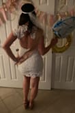 This dress was absolutely perfect for all of my wedding events! I wore it for my bachelorette party and felt AMAZING in it! It's the perfect blend of classy and sexy! It fits perfectly, though the lace on the back was a little loose at the top like other reviews said, but it was still comfortable and didn't take away from the look of the dress! - Amanda S.