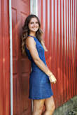 I really love the dress! It fits perfectly and is true to size. It's also comfortable and is NOT restrictive! The back of the dress is super cute; however, I have to wear sticky boobs to avoid seeing the bra clasp. The pockets are deeper than expected too! The color is also as pictured! - Ashley K.
