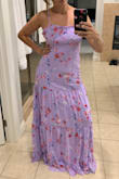Fit perfectly in all the right areas. Loved the length. I prefer it a little longer. The adjustable straps are perfect for if I want it shorter or longer depending on shoes. I have it longer in the photo. Could adjust to have no drag though. It has enough room in the hip area, which I was nervous about seeing it was more fitted. Beautiful fabric. It's casual but still very cute. Love it! - Mary S.