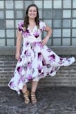 Loved this dress! I am in between sizes so took two tries but the XL fit me best. The fabric is not super stretchy but it is soft. Got plenty of compliments on the dress! Super fun for dancing on the dance floor. - Sarah P.
