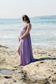 I ordered a size larger than usual because I heard the waistline was tight! Perfect!! Loved this dress for our maternity session. I was 30 weeks pregnant in this photo. - Brittanie H.