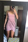 I bought this dress to wear to a wedding I will be going to and as soon as I opened the package I knew it was going to be great! The color is exactly what the photo looks like and I am ecstatic to wear this cutie to the wedding! It fits PERFECTLY and with my small chest I could even get away with no bra! True to size, the length is fine by me. I like not too short not too long, and that's exactly what this is! The fabric is so comfortable and a little stretch to it which I like; not suffocating. I am seriously going to get this dress in every color! Definitely recommend, 10/10! - Hannah A.