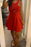 Stated runs large because I'm a solid medium in all other brands but size small in Lulus. As others have stated this dress really is a stunner! I love the style, the top is very flattering and unique. I managed to barely fit a nude strapless bra underneath it, but the peep hole kinda sits right at the bottom of my bra, so hopefully will work, might go braless. Otherwise no other complaints. I can see me wearing this dress to all sorts of occasions in the future. - Samantha Z.