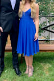 This was the perfect dress for a cocktail wedding in July. LOVE that it's adjustable, and you don't have to wear a bra because the material around the bust is thick enough. It does wrinkle easily and it's a bit low-cut, but for less busty girls that shouldn't be a problem. - Amanda F.
