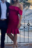 Fun dress to wear for a wedding. The material is thick and stretchy so it worked with my 6 month baby bump, it was a tiny bit too big but still flattering. - Talia A.