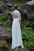 I wore this dress for my wedding. She was perfect. The fabric is of good quality and does not crease. The cut is doing very well. I only had to adjust the width of the sleeves and the seam to the shoulders to make it tighter otherwise the rest fit me perfectly. I highly recommend this dress. - Lanie R.