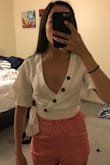 I'm not sure if it's because I have a very small chest, but this was way too lose and didn't have a way to tighten it. I'm typically an XS/S in Lulus and ordered the XS, but my sticky boobs kept showing and it didn't look flattering on me. - Sonja S.