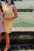 This dress fit perfect. Great length, size, and fit. Would 100% buy again. Material is great and the color was perfect. Built in slip was a plus as well. - Lara B.
