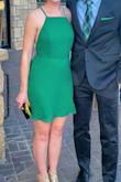 I adore this dress! A favorite in my closet. The green is so beautiful, a true grass green like the Lulus picture, and the material is smooth and lightweight (and lined). Needs light steaming before wear to get out the wrinkles. It's good for a pear shape: the X strap backless feature is flattering for slender shoulders/neck while the skater style draws attention away from the hips. I've worn this dress to weddings and spring formals and over a year later I still look for excuses to wear it. I wear this with pasties with complete confidence. If you have a large chest area you might need to consider how much side boob you can handle; my chest is on the smaller side and it shows just enough for me. - Elise F.