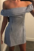 This dress fit perfectly not too tight. The dress is quite short if you are on the taller end of the spectrum however still appropriate. - Kevin M.