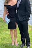 Snug in the right places. Was iffy about the slit at first for a wedding, but ended up staying in place and kept it classy. Also had limited mobility in the arms when dancing, but looked great for pictures! - Leah B.