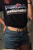 Super cute leather belt in a soft pink color. I got the smallest size possible and it's still a tiny bit big, so I may need to add an extra hole or two. My pant size is a 38 in European sizing. - Lindsay H.