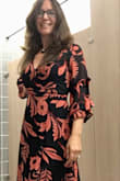 The print definitely makes a statement! Love the sleeves on this and the flowy fabric. Pairs great in winter with a black scarf and lace up boots or some black pumps for the rest of the year! - Jennifer M.
