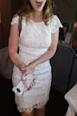 I wore the dress for my bridal shower and got many compliments (especially on the open back). Because I'm smaller chested, and it's an open back, I couldn't wear an actual bra. So I had to wear a sticky backless/strapless bra which doesn't add anything to my cup size...so there was definitely extra room up top. It was still very pretty though! - Rachel F.