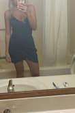 I liked it a lot. Tight fitting. A more spandex like material than I was expecting. A little short in the front, I felt like I was tugging on it a bit all night. Back length was perfect. - Mackenzie W.