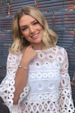 This item is perfect and so classy. It can easily be dressed up or down! I have worn with shorts and jeans. :) Great item to pack for a summer vacay! - Landri S.