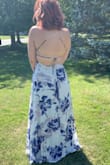 I bought this for a wedding and I felt so gorgeous in it! There's a lot of fabric to it but it feels heavy and high quality. It definitely was difficult to wear with my bigger chest and the sticky bra I chose was awful. So I'd recommend this dress to smaller chested ladies. - Danielle T.