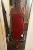I just had a baby and am in between a medium and large, the medium fit but I was slightly uncomfortable so I reordered a large (pictured) and love it. The color is so pretty for summer and the length is perfect. - Ian H.