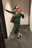 I bought this dress for work it's long and looks cute with just about any shoes. It's a thick material not see though. - Victoria O.