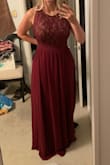 Very pretty dress. I am using it as a bridesmaid's dress and the quality is great for the price. I am planning to take it in a bit at the waist but I had to order a large for the bust. I am also planning to wear a regular bra and just pin the straps to the dress. I was worried about under garments, because I hat strapless bras, but it should be just fine with a regular one. - Megan M.