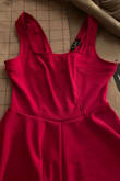 This dress is the perfect color and fits very nice on! My main issue with the dress is that there are very prominent seam lines running down the middle of the skirt, running across the skirt 6 inches off the bottom and 2 panels on the top portion of the dress. Other than that it's a great material and is super comfy! - Alexis V.
