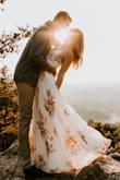 I absolutely love this dress! I wore it for my engagement photos and it was perfect! It was a little long but would be perfect with heels. The wrap around feature makes it completely adjustable to fit many different shapes and sizes! - Amanda B.