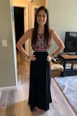 Super cute. Fits perfectly. True XS. I am pretty tall and wore 3 inch wedges and it fit perfectly length-wise so it may be a little long for someone on the shorter side. I got so many compliments on this dress. It's extremely comfortable and really flattering. Even though the back is partially open, you can wear a strapless bra with it and it'll be hidden well too which I also loved. - Nicole M.