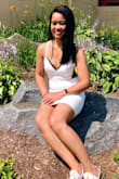 I wore this dress to my bachelorette party. This dress fit perfectly and looked absolutely beautiful! The lace back was stretchy and helped keep it from being too tight. - Bernadette J.