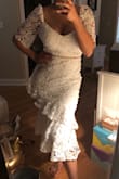 This dress reminds me of a flamenco dancer. I love how I feel in it. Very sexy fitted dress yet elegant in style. The perfect balance. Sleeves are loose so make my arms bigger than they are but I love it anyway. I'm normally a size 8 and ordered a Large which fit perfectly. Size chart says 8 is a medium and for most Lulu dresses I find that I need a large. - Lisa K.