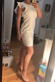 Very sleek style that shows the right amount of leg. Very modern looking - great for an art gallery event. My issue with this is the fabric; it's somewhat thin and does not feel like very high quality. It's wrinkle prone which is a huge turn off since I don't ever want to iron. I will end up returning this and going with a lace free that won't wrinkle. Note the model is wearing a dress with the detail sleeve on her left but the dress I got had the sleeve detail on the right.
I'm normally a size 8 and ordered a Large which fit slightly loose but looked good. Size chart says 8 is a medium and for most Lulus dresses I find that I need a large. - Lisa K.