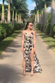 Absolutely love this jumpsuit. I wore this to a wedding in Hawaii and got non stop compliments and it was comfortable to easy, drink and dance in all night.

The thigh slits are very very high, so this is not a good choice for a modest event. - Delaney A.