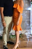 I love this dress, I am always a small in Lulus but could've done an xs in this as it's got a little wiggle room. It did come a little wrinkly but not a big deal. The color is true to the orange very summery I am wearing to a summer wedding this weekend! Definitely a longer dress and is thick and nice material. I'm 5'7"140lbs ordered small could've probably done xs. I got SO many compliments. - Karrah N.