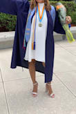This is a beautiful dress.  Love the color and the style. This was perfect for my graduation especially with the pockets where I could put my phone and keys without needing a bag. Falls beautifully. I got lots of compliments. Need the same dress in more colors. - Evangeline C.