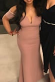 I was skeptical about ordering a dress online for a wedding but was extremely pleased! It fit me perfectly! I am short so I did have to get it hemmed but other than that, it was great. I received many compliments on it. I will add, if you are busty it reveals cleavage so keep that in mind. - Thericia G.